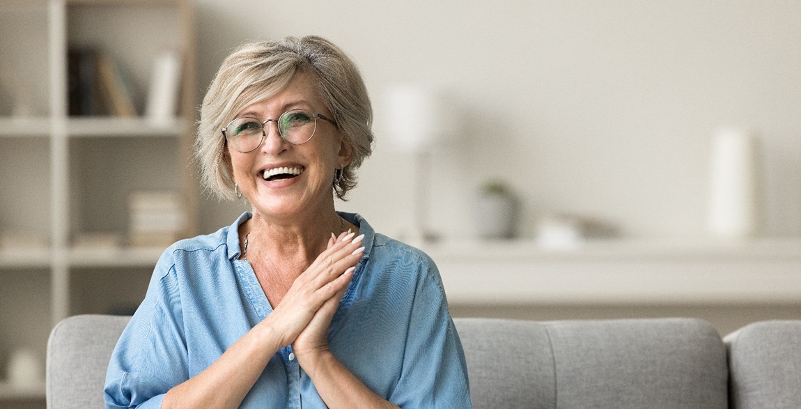 Laughing senior woman with attractive teeth